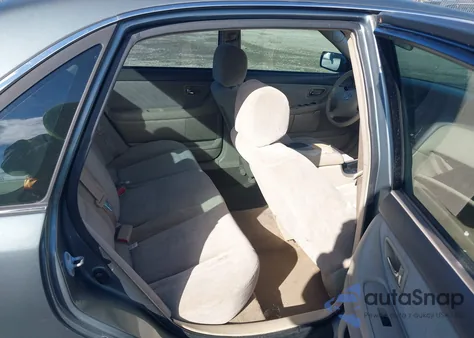 2002 Toyota Avalon Xl z USA, uszkodzony, nr VIN 4T1BF28B72U202866